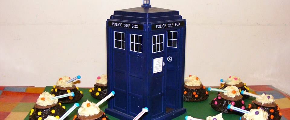 Doctor Who 50th Anniversary Dalek Extermi-cakes surrounding TARDIS.